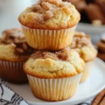 Swirled Cinnamon and Sugar Muffins: Delicious Homemade Treats Swirled Cinnamon and Sugar Muffins Freshly baked cinnamon sugar muffins arranged on a rustic wooden table, showcasing a golden-brown crust with swirls of cinnamon and sugar, soft fluffy texture, warm steam rising, surrounded by a sprinkle of cinnamon and a small bowl of sugar, with a cozy kitchen backdrop. Start your day with warm, homemade muffins that fill your kitchen with cinnamon and sugar. These muffins turn a regular morning into a special treat. They mix the comfort of sweet pastry with a spicy cinnamon swirl. Making these tasty breakfast treats is simple. You just need a few ingredients and basic baking skills. They're perfect for a quick breakfast or a delicious snack. These cinnamon sugar muffins will soon be your favorite recipe. Key Takeaways Perfect blend of sweet and spicy flavors Simple recipe with minimal preparation time Versatile breakfast or snack option Easily customizable with different toppings Can be stored for several days or frozen The Perfect Blend of Cinnamon and Sugar in Every Bite Explore the magical world of cinnamon sugar blend. It turns simple muffins into amazing treats. The mix of cinnamon and sugar creates a taste experience that excites your senses and brings comfort with each bite. Cinnamon Sugar Muffin Flavor Profile A close-up view of freshly baked cinnamon sugar muffins, golden-brown with a perfectly swirled topping of cinnamon and sugar, soft and fluffy texture visible inside, sprinkled with fine sugar crystals, surrounded by warm spices such as cinnamon sticks and a light dusting of powdered sugar on a rustic wooden table. Understanding the Classic Flavor Combination The sweet and spicy mix of cinnamon sugar is a wonder in the kitchen. It has pleased bakers for many years. This blend offers a taste that is both warm and slightly zingy. Cinnamon adds a rich, aromatic warmth Sugar brings a sweet delight Together, they make a perfectly balanced flavor The Science Behind Sweet and Spicy Balance The science behind cinnamon sugar is fascinating. The cinnamaldehyde in cinnamon and sugar's sweetness create a unique taste. This interaction makes the muffins hard to resist. "Cinnamon is not just a spice, it's a culinary experience that bridges sweet and spicy in perfect harmony." Why These Muffins Stand Out Your homemade cinnamon sugar muffins are special. They use a precise swirl technique to spread flavor evenly. Unlike regular muffins, these offer a consistent taste from start to finish. Consistent flavor distribution Perfectly balanced sweet and spicy notes Moisture-rich texture Essential Ingredients for Bakery-Style Results Muffin Ingredients for Bakery-Style Baking An assortment of fresh ingredients for baking cinnamon and sugar muffins, including a bowl of flour, a jar of sugar, a stick of butter, eggs, ground cinnamon, and a measuring cup filled with milk, all arranged artistically on a rustic wooden kitchen counter, with some scattered cinnamon sticks and sugar granules for added texture. Creating bakery-style muffins starts with the right ingredients. Quality makes a big difference. Your cinnamon sugar muffins will stand out with the right choices. Here are the key ingredients for top-notch results: Flour Foundation: 2 cups of all-purpose flour provides the perfect base Unsalted butter (1/2 cup) for rich flavor Granulated sugar (3/4 cup) for sweetness Fresh eggs (2 large) for structure Baking powder (1 tablespoon) for perfect rise "The secret to bakery-style muffins lies in precision and quality ingredients." - Professional Baker's Wisdom Moisture is key for tender muffins. Adding sour cream (1/2 cup) and milk (1/2 cup) helps. They make your muffins soft and delicious. The cinnamon sugar swirl is a game-changer. Mix 3/4 cup sugar with 1 tablespoon of cinnamon. It turns your muffins into a bakery favorite, right in your kitchen. Swirled Cinnamon and Sugar Muffins: Step-by-Step Recipe Making the perfect muffin recipe takes skill and love. Turn your kitchen into a bakery with these tasty swirled cinnamon and sugar muffins. They will excite your taste buds and wow your family. Preparing the Cinnamon Sugar Filling Your cinnamon sugar filling is the key to these muffins. Mix 1/2 cup light brown sugar with 3 teaspoons of ground cinnamon. This mix creates a sweet, spicy swirl that makes your muffins stand out. Mix brown sugar and cinnamon thoroughly Use a fork to break up any sugar clumps Set aside for layering in the batter Creating the Perfect Muffin Batter A great muffin batter needs the right ingredients and mixing. Mix 1 3/4 cups all-purpose flour with 1/2 cup old-fashioned oats. This creates a strong base for your muffins. Blend dry ingredients separately Whisk wet ingredients until smooth Gently fold wet and dry ingredients together Mastering the Swirl Technique The swirl technique turns a simple muffin into a masterpiece. Fill muffin cups with batter, add cinnamon sugar filling, and top with more batter. "The magic happens when you create beautiful, consistent swirls in each muffin" - Baking Experts Use a toothpick or skewer to make marbled patterns. This ensures each bite has the right mix of muffin and cinnamon sugar. Bake at 350°F for 20 minutes. You'll get 12 delicious muffins that will be a hit with your family. Streusel Topping and Cream Cheese Glaze Make your cinnamon sugar muffins even better with streusel topping and cream cheese glaze. These toppings turn a simple baked good into a fancy treat that will wow your guests. The streusel topping adds a crunchy texture and more sweetness. Here's how to make the perfect streusel topping: ½ cup all-purpose flour ⅓ cup white sugar ½ stick softened butter ½ teaspoon ground cinnamon ¼ teaspoon salt Mix these ingredients until they're crumbly. Sprinkle about 2-3 teaspoons over each muffin before baking for the best taste and texture. For an extra special touch, add a cream cheese glaze. This topping adds a tangy richness that complements the cinnamon: 8 oz cream cheese ¼ cup white sugar ½ teaspoon vanilla extract 2-3 tablespoons milk (for desired consistency) "The secret to an amazing muffin is in its topping!" - Baking Enthusiasts Drizzle the cream cheese glaze over cooled muffins for a fancy bakery look. These toppings not only look great but also add more flavor and texture, making your homemade treats unforgettable. Professional Baking Tips and Techniques Mastering muffin baking is more than just a recipe. Professional bakers use special techniques to make their treats stand out. Here are some expert tips to improve your muffin-making skills. Temperature Control Secrets Oven temperature is key for perfect muffins. Start by heating your oven to 425°F for 5 minutes. Then, lower it to 375°F. This method helps create tall, dome-like muffin tops. Mixing Methods for Perfect Texture The right mixing technique is crucial for great muffin texture. Follow these tips for light and fluffy muffins: Mix dry and wet ingredients separately Fold ingredients gently - do not overmix Stop mixing when ingredients are just combined Use room temperature ingredients for better integration Storage and Freshness Guidelines Proper storage keeps your muffins fresh. Here are some tips: Store at room temperature in an airtight container Consume within 2-3 days for best taste Freeze for up to 3 months in a sealed freezer bag Thaw at room temperature or reheat at 350°F for 10 minutes "The difference between a good muffin and a great muffin is in the details." - Professional Baker's Wisdom Variations and Creative Twists Exploring muffin variations can turn your classic cinnamon sugar recipe into a fun adventure. Creative baking lets you add unique flavors that will amaze your taste buds. Here are some tasty ways to make your muffins special: Fruit Infusions: Blueberry swirl muffins Diced apple cinnamon version Raspberry chocolate chip blend Nutty Additions: Chopped pecans Sliced almonds Walnut crumble topping Exotic Spice Combinations: Cardamom and orange zest Nutmeg and vanilla Ginger and maple glaze If you follow special diets, you can still enjoy these muffins. Use gluten-free flour or non-dairy milk. Vegans can use flax seeds or applesauce instead of eggs. *Baking is an art of experimentation - don't be afraid to add your personal touch!* For great muffin variations, keep the right moisture and texture. Start with small changes and adjust as needed for the best taste. Conclusion Your journey to making tasty cinnamon sugar treats is just starting. These homemade muffins are more than a recipe. They open the door to baking success, turning your kitchen into a cozy bakery. With every cinnamon swirl and sugar sprinkle, you've picked up valuable skills. These skills turn simple ingredients into amazing baked goods. The beauty of these muffins is their ease and flexibility. Whether you're new to baking or have lots of experience, this guide helps you make delicious treats. These treats will wow your family and friends. Remember, baking is all about practice and passion. Feel free to add your own twist with blueberries, chocolate chips, or nuts. This makes the recipe truly yours. We encourage you to share your baking stories and special touches. Post pictures of your cinnamon sugar muffins on social media. Tag your favorite baking groups. Your creativity could inspire others to start their own baking journeys. So, it's time to fire up the oven, get your ingredients ready, and make memories with every muffin. Happy baking! FAQ Can I make these muffins ahead of time? Absolutely! You can make the muffins up to 2 days in advance. Store them in an airtight container at room temperature. Or, freeze them for up to 3 months. When freezing, wrap each muffin in plastic wrap. Then, put them in a freezer-safe bag. This keeps them fresh and moist. How can I ensure my muffins don't become dry? To keep muffins moist, avoid overmixing the batter. Mix ingredients just until they're combined. Use the toothpick test to check if they're done - a few moist crumbs are fine. Also, using buttermilk or sour cream helps a lot. They keep the muffins moist and delicious. Can I make these muffins gluten-free? Yes! Use a gluten-free flour blend instead of all-purpose flour. Make sure the blend includes xanthan gum for better texture. Also, check that all other ingredients are gluten-free. What's the best way to create the perfect cinnamon sugar swirl? Use a butter knife or skewer to swirl the batter gently. Make sure to not overmix. You want to see distinct cinnamon sugar ribbons in the muffin. How long do these muffins stay fresh? These muffins stay fresh for 2-3 days in an airtight container at room temperature. You can refrigerate them for up to 5 days to keep them longer. Always let refrigerated muffins come to room temperature before serving. This ensures the best flavor and texture. Can I substitute the sugar in this recipe? Yes, you can try different sweeteners. Brown sugar adds a rich flavor, while coconut sugar offers a more complex sweetness. For less sugar, use a sugar substitute made for baking. What if I don't have a muffin tin? No problem! You can use a cake pan or cast-iron skillet to make a large cake. Adjust the baking time as needed. Keep an eye on it, as different pans cook differently.